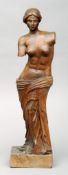 A French 19th century carved wood figure of Venus Typically modelled, standing on a plinth base.