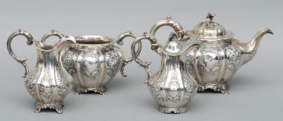 A Victorian four piece silver tea set, hallmarked London 1855, maker’s mark of SH DC The teapot with