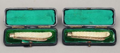 A pair of Victorian mother-of-pearl mounted silver fruit knives, hallmarked Sheffield 1897, maker’