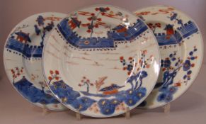 Three 18th century Chinese plates Decorated in the Imari palette. 22.5 cms diameter. (3)Generally in