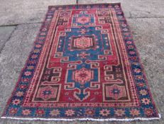 A Hamadan wool rug 205 x 120 cms.