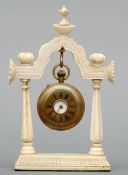 A 19th century Anglo-Indian ivory watch stand Of carved temple form; together with a Victorian