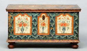 A 19th century painted pine chest The hinged rectangular top enclosing a candle box, the front