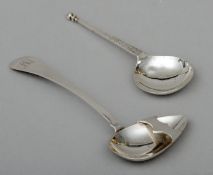 A 19th century unusual feeding spoon With engraved initials, marked with a lion passant and STG.