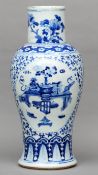 A 19th century Chinese porcelain blue and white vase The tall neck decorated with floral sprays, the