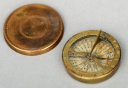 An 18th century brass cased compass sundial The folding brass gnomon and numeral inscribed Dial
