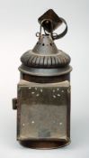 A 19th century sheet metal lantern Of typical form, pierced, with strap handle and suspension