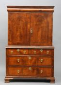 An 18th century walnut cabinet on chest The moulded rectangular top above a single cushion drawer