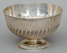 A Victorian silver punch bowl, hallmarked London 1888, maker’s mark of ERM The half gadrooned body