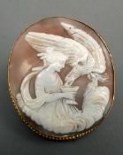 A Victorian 9 ct gold framed cameo brooch The front carved with a classical maiden feeding an eagle.