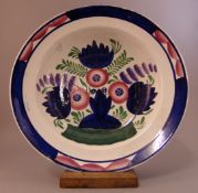 A 19th century Scottish Portobello pottery plate Typically decorated with flowers and foliate