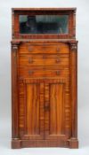 A 19th century Goncalo Alves side cabinet The shelved mirrored back above an arrangement of three