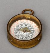 An 18th century brass and polished steel cased compass sundial The compass interior with printed