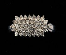 An 18 ct white gold diamond set cluster ring