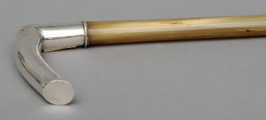 A late 19th century Chinese white metal mounted horn walking cane, Chinese script mark and maker’s
