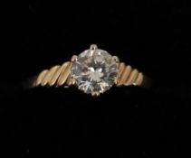 A 9 ct gold diamond solitaire ring The claw set stone approximately 0.5 carat.Some inclusions to