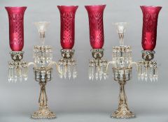 A pair of Victorian Baccarat candelabra The central lustre hung clear glass flute issuing twin