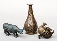 A small collection of Oriental and Eastern metalware Including: a verdigris patinated oxen, a