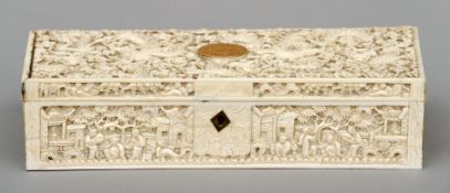 A late 19th/early 20th century Canton carved ivory box The hinged rectangular cover profusely carved
