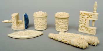A quantity of Cantonese carved ivory sewing accessories Including: two clamps, two needle cases, two