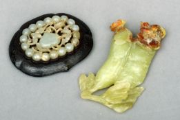 A carved jade model of a fruit and a butterfly and a carved jade ruyi sceptre panel 9.5 cms high. (