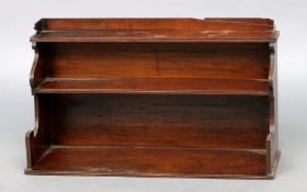 A 19th century mahogany waterfall bookcase The galleried top above two shelves, supported by