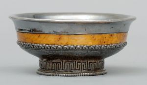A white metal mounted burrwood mazer bowl With scroll and Greek key chased decoration. 11 cms