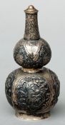 A small Chinese unmarked white metal double gourd bottle With chased and engraved decoration