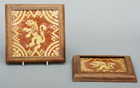A pair of Franco-Flemish 17th century floor tiles Each slip decorated with a rampant lion, framed.