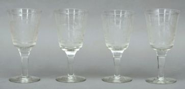 A set of four 19th century wine glasses Each wheel engraved with various cock fighting scenes,