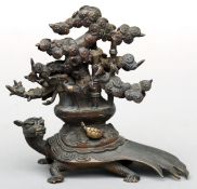 A 19th century Oriental bronze model of a turtle His back mounted with miniature storks amongst a