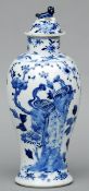A Chinese porcelain blue and white vase and cover Of baluster form, decorated with exotic birds