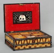 A 19th century Anglo-Indian ebony and porcupine quill work box The hinged lid decorated with bands