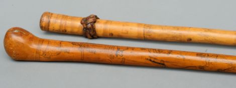 A 19th century penwork walking stick The shaft decorated with figures and animals including Scottish