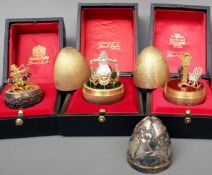 A Stuart Devlin silver and silver gilt egg The exterior decorated with bells, the interior with a