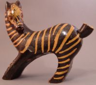A French pottery zebra by Primavera Stylistically modelled and slipware decorated, impressed mark to