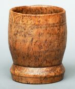 A Swedish 19th century turned burr birch mortar With ring turned decoration. 13 cms high.Generally