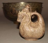 A South East Asian silver coloured metal bowl and a Chinse silver coloured metal ewer In the form of