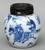 A 19th century Chinese porcelain blue and white ginger jar and cover The body decorated with a