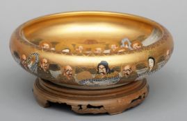A late 19th/early 20th century Japanese Satsuma bowl The gilt heightened interior decorated with a