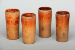 A set of four 19th century turned willow dice shakers Each with traces of original red paint. 11.5