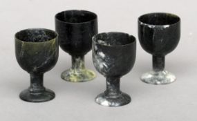 A set of four carved hardstone miniature goblets 5.5 cms high. (4)Generally in good condition,