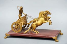 A Grand Tour style ormolu charioteering group Modelled naturalistically with a rider and two horses,