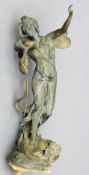 An Art Nouveau style patinated bronze model of a winged fairy Modelled standing on a naturalistic