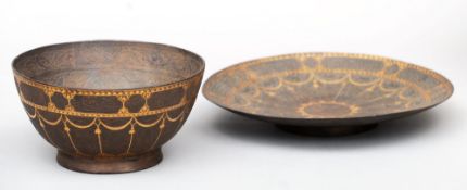 A 19th century Middle Eastern steel bowl and plate Each with trailing gilt decoration flanking