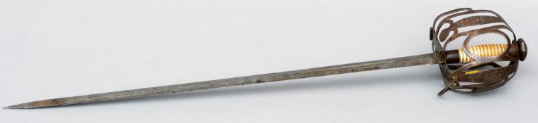 A Scottish Claymore sword, possibly 18th century With an ivory handle and pierced basket hilt. 84