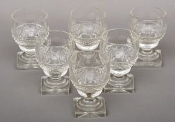 A set of six English 19th century cut glass rummers Each standing on a square foot. 11.5 cms