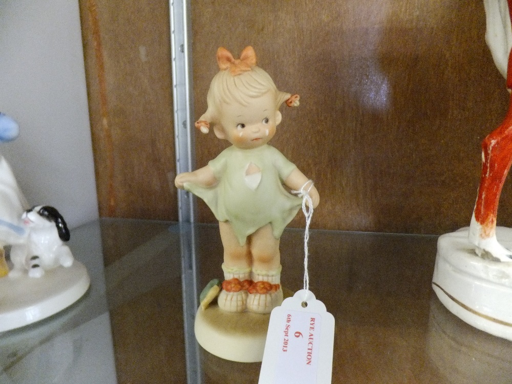 A Mabel Lucie Attwell figurine "mommy i teared it"