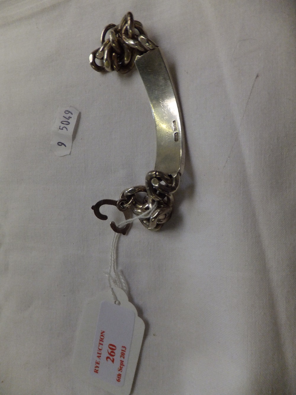 A silver identity bracelet