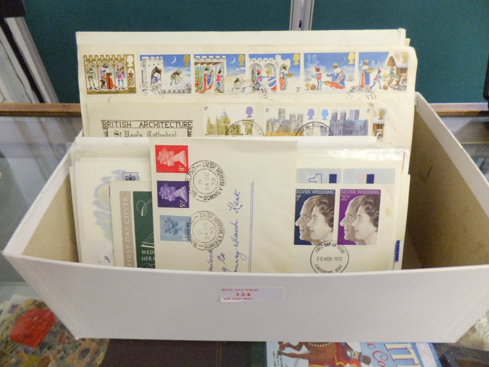 A collection of first day covers and stamp packs